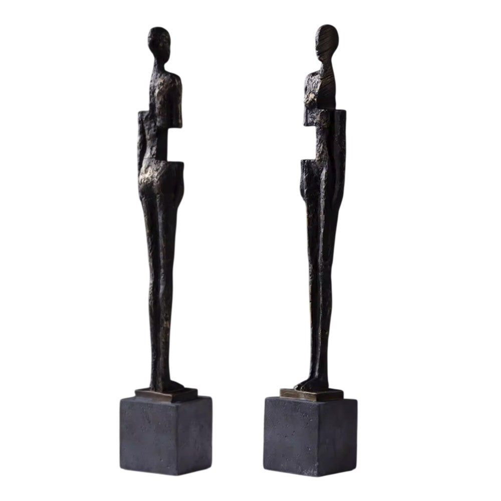 Front view of female antique bronze resin abstract figure sculptures on black bases