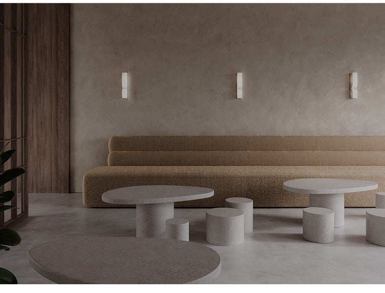 Interior setting showing three sconces in a minimalist lounge