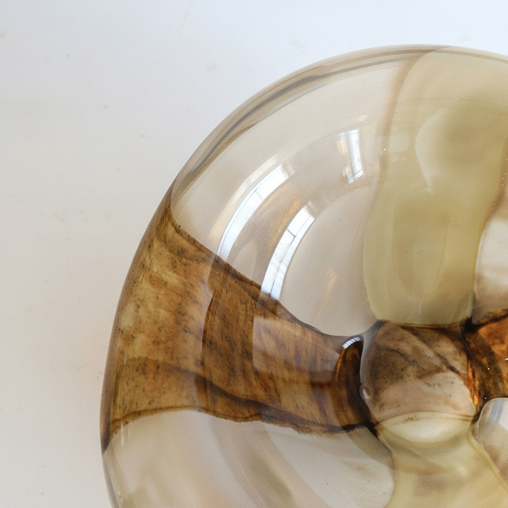 Close up detail of amber glass texture and swirl pattern