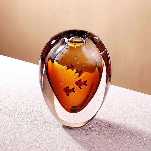 Angled view of oval glass vase showing depth and clarity