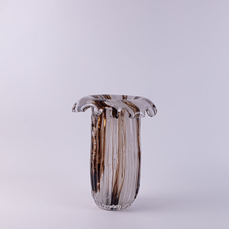 Tall art glass vase with wavy rim and brown swirls