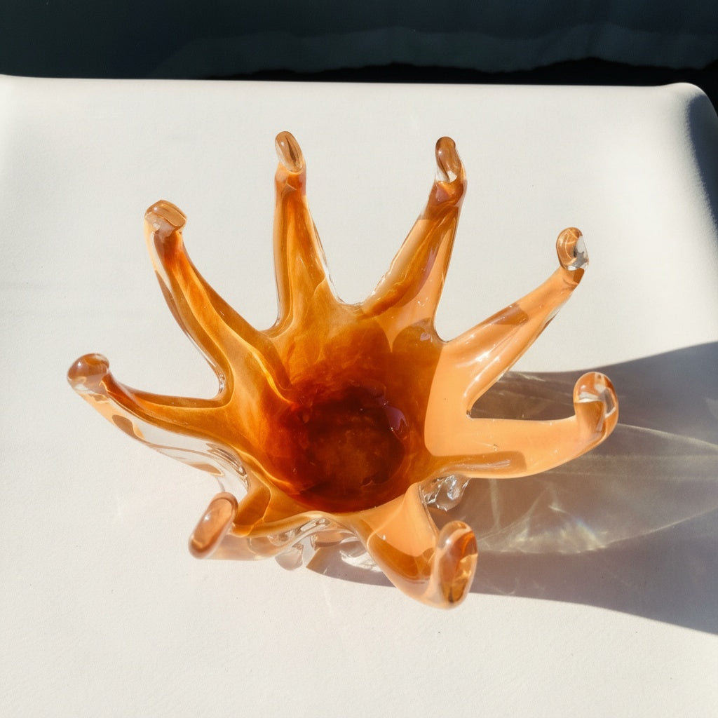 Top view of amber glass bowl showing organic splash shape