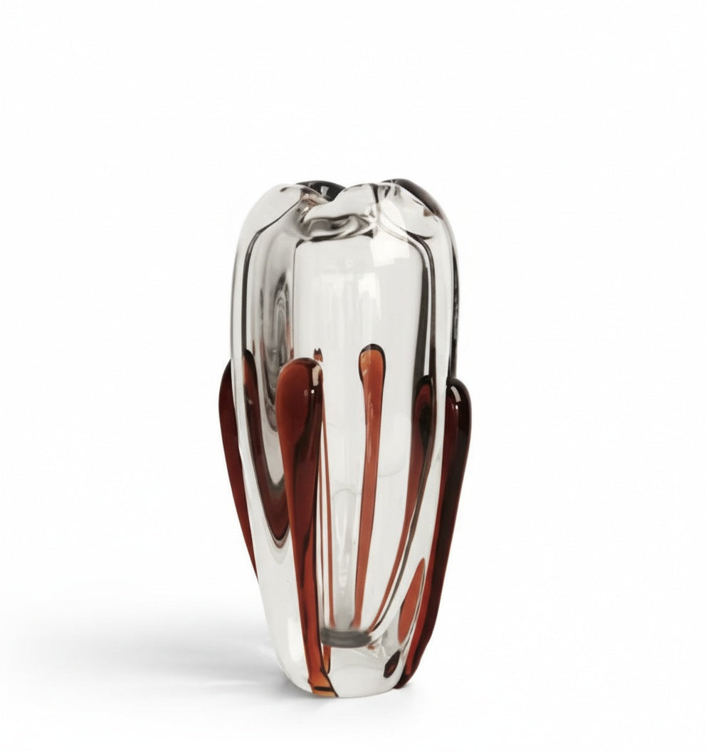 Angled view of amber accents on clear glass vase