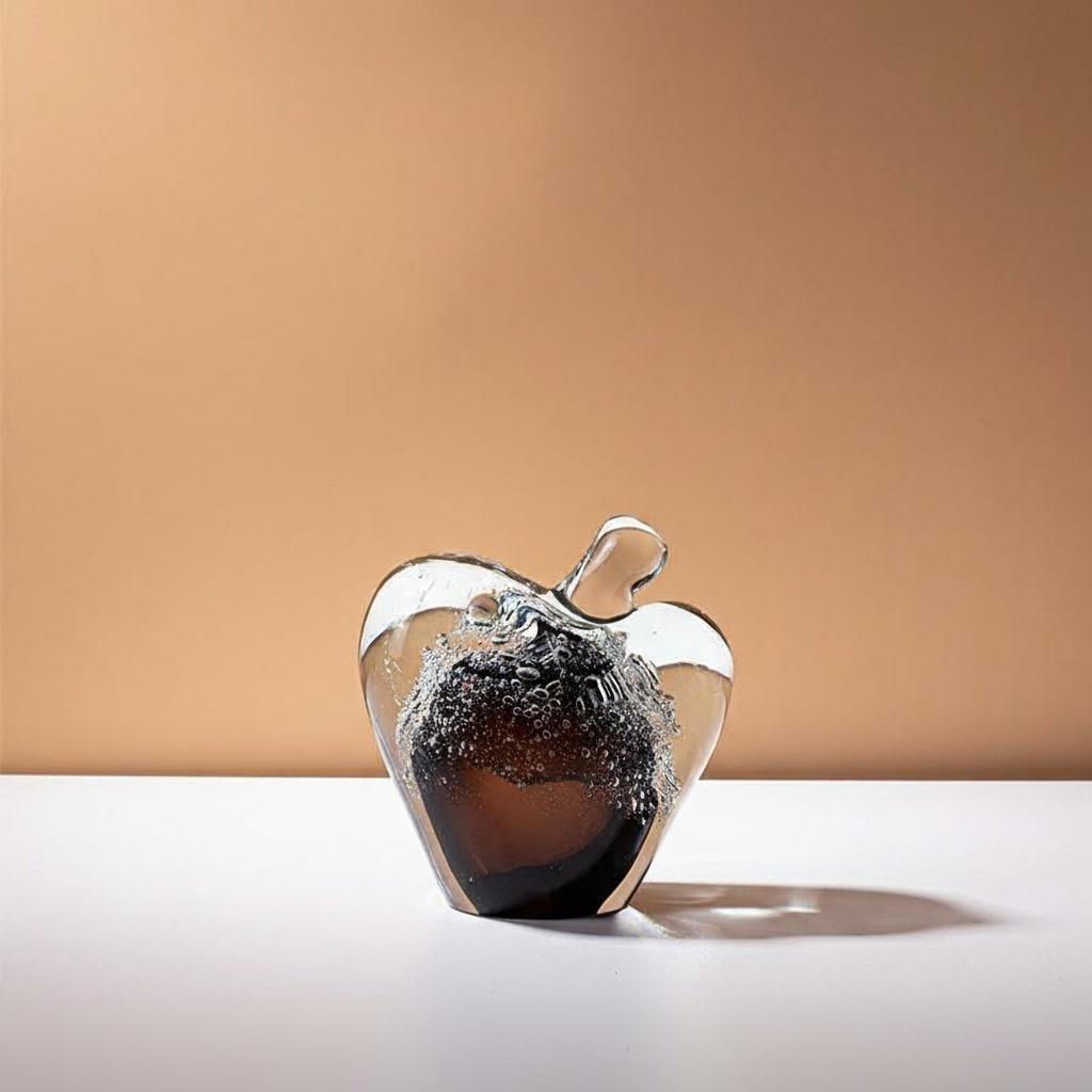 Medium amber art glass apple paperweight