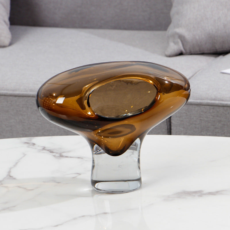 Large organic shaped amber glass vase with clear base