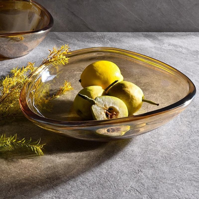 Large amber glass centerpiece bowl filled with lemons and pears
