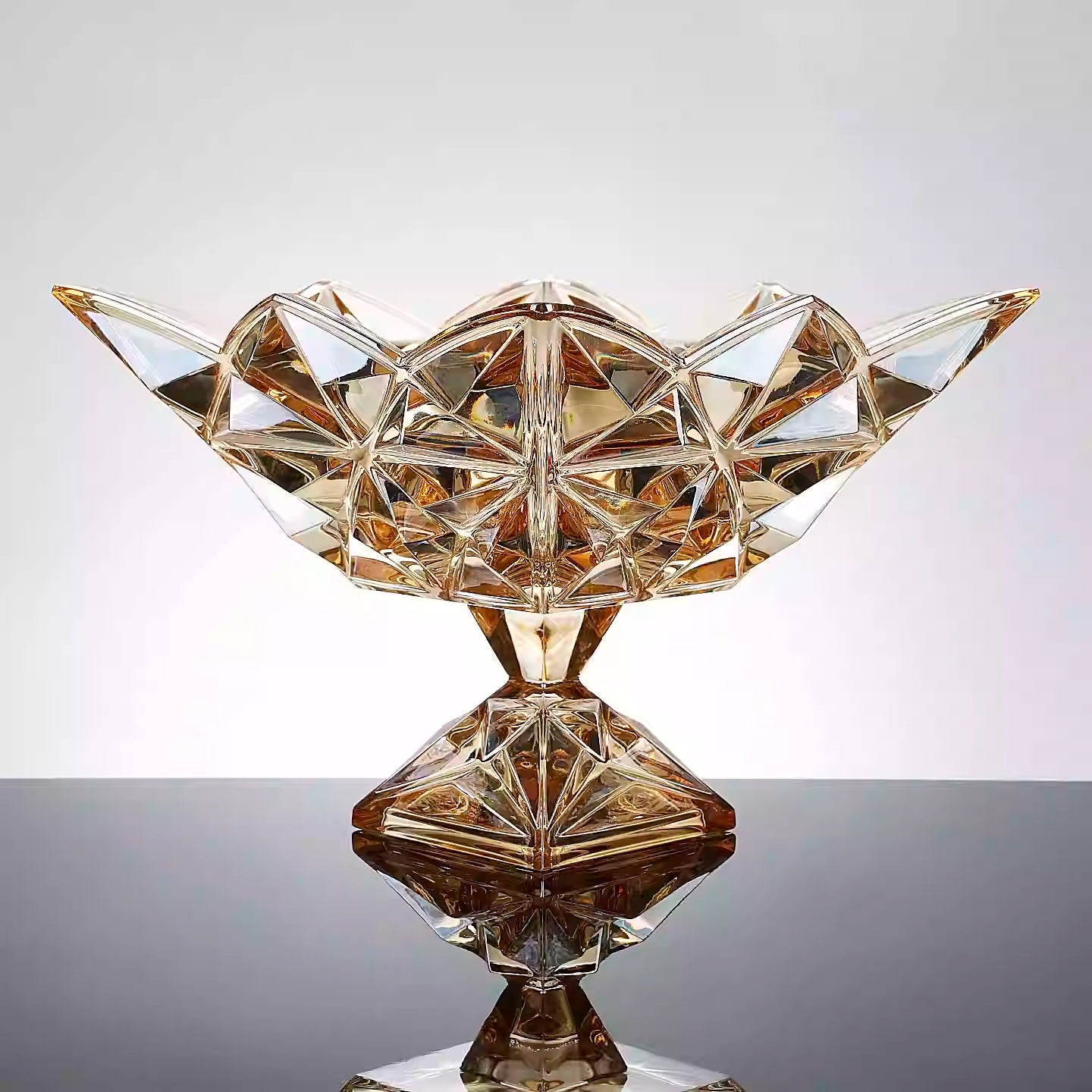 Front view of amber crystal geometric fruit bowl