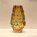 Large amber faceted glass vase front view
