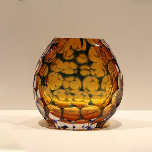 Medium amber faceted glass vase front view