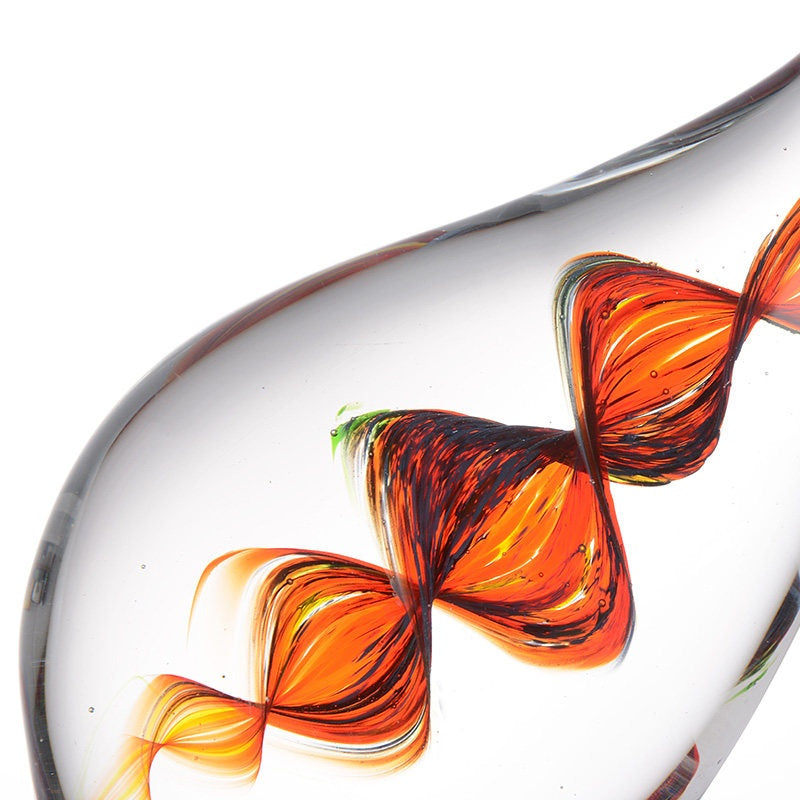 Close up detail of the internal orange and amber spiral pattern