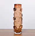 Large cylindrical amber glass vase