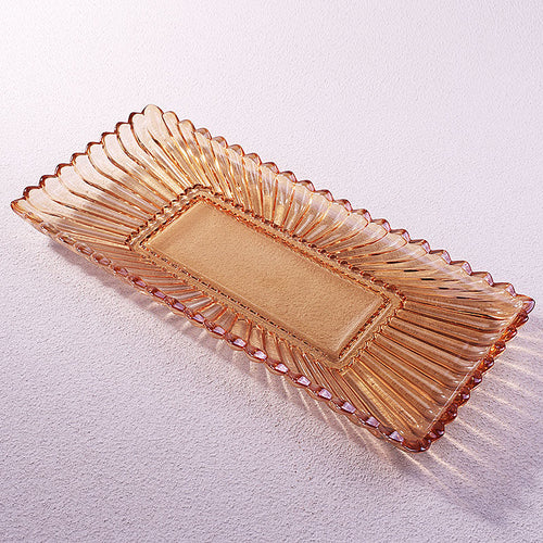 Empty amber glass fluted tray angle view