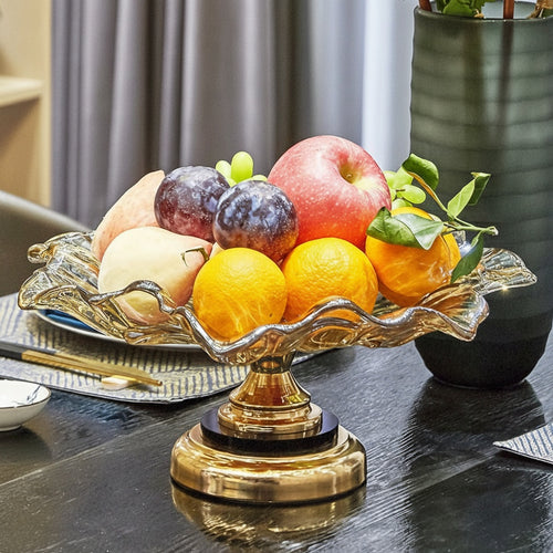 Side view of amber glass fruit bowl with fresh fruit
