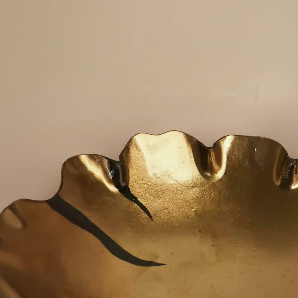 Detail of organic wavy rim on gold and amber bowl