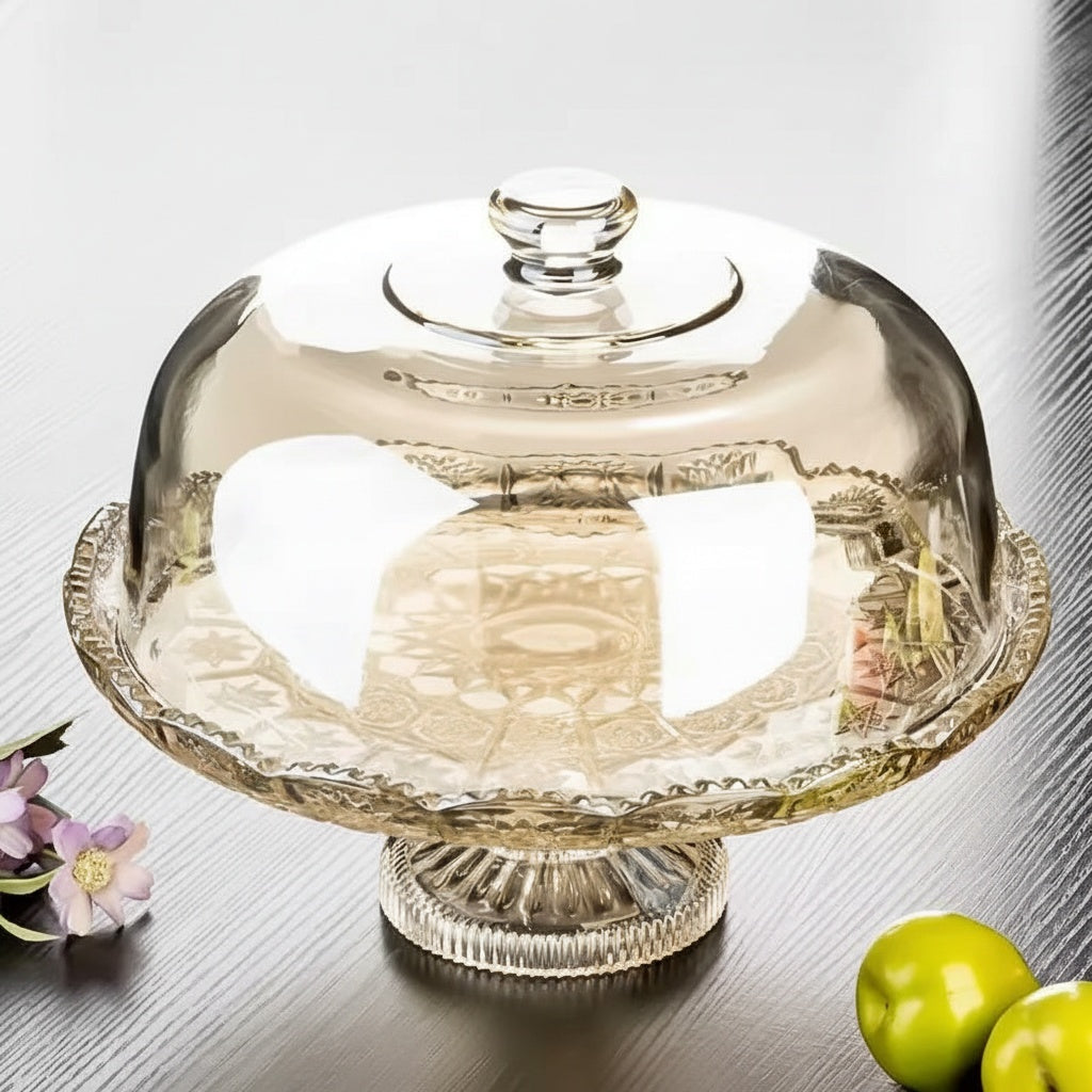 Empty amber glass pedestal cake stand with patterned base