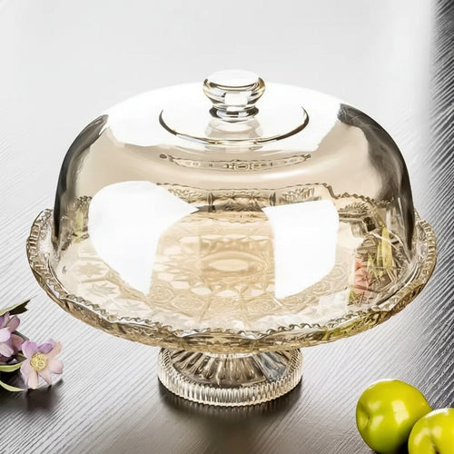 Empty amber glass pedestal cake stand with patterned base