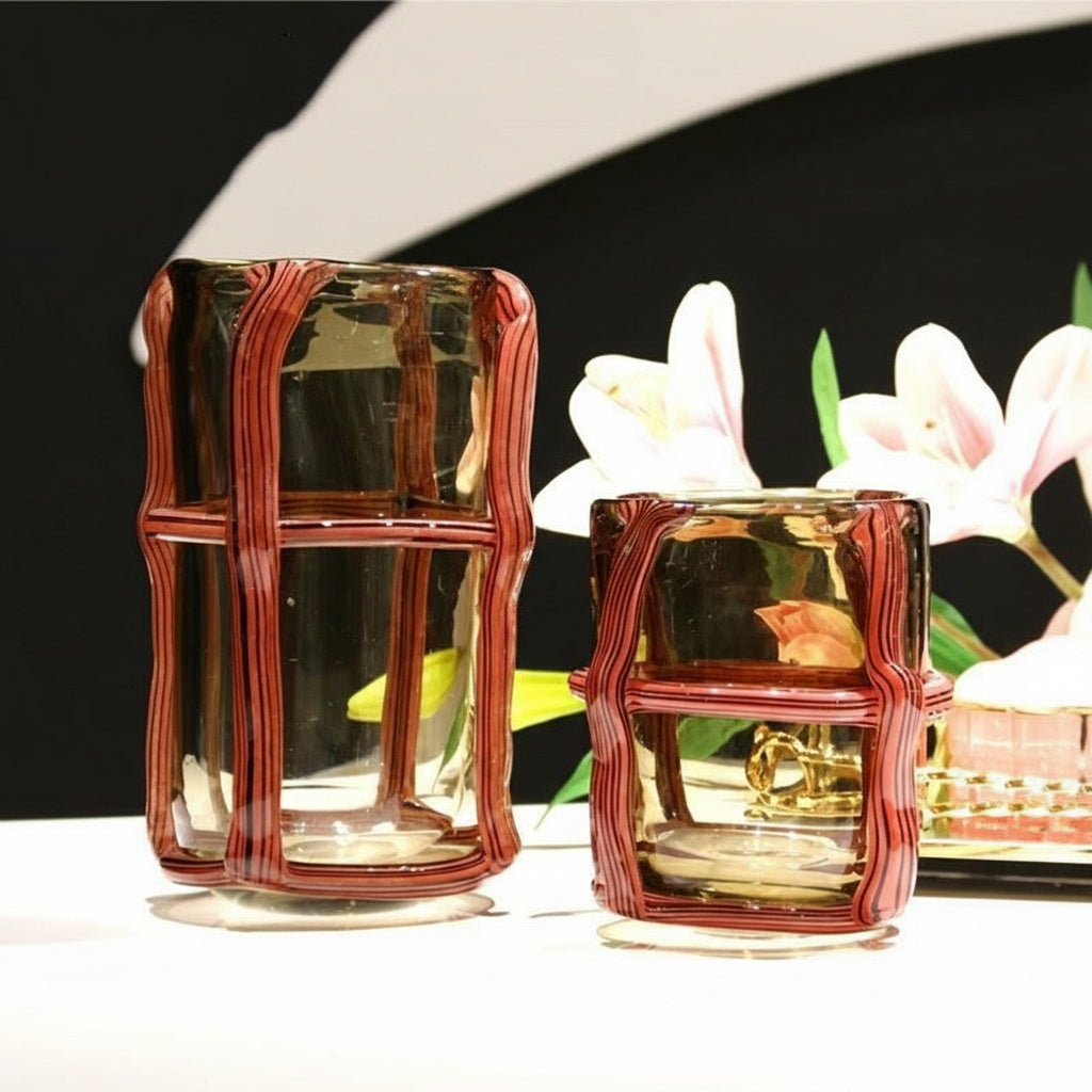 Amber glass vase with red cane cage detail group shot