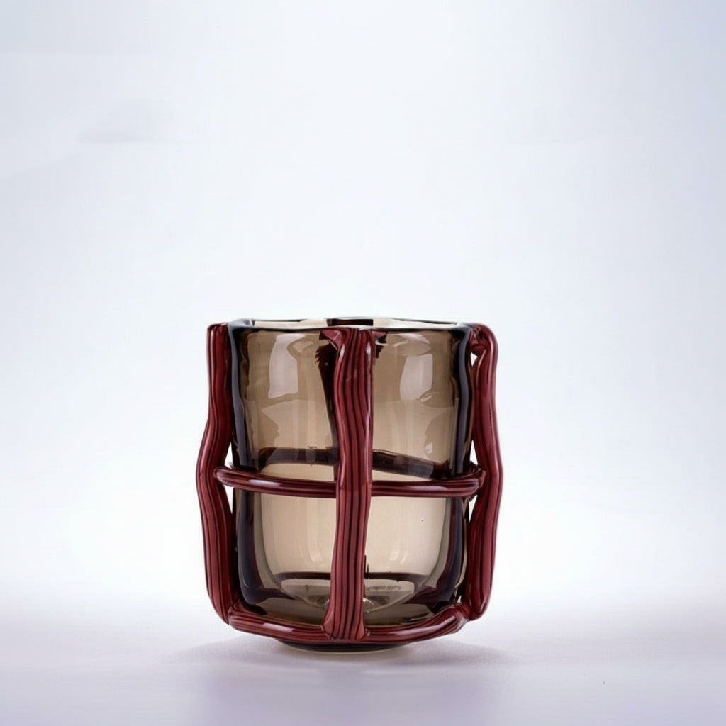 Medium amber glass and red cane caged vase front view