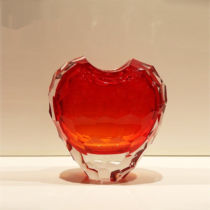 Single large faceted red crystal heart vase front view