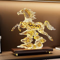 Translucent amber resin horse sculpture on wooden base side view