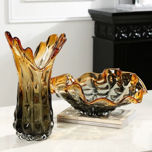 Amber and smoke gradient glass vase and bowl set on table