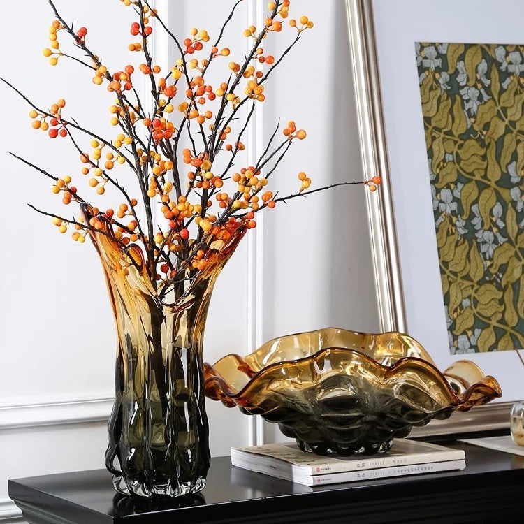 Gradient glass vase with berry branches and decorative bowl