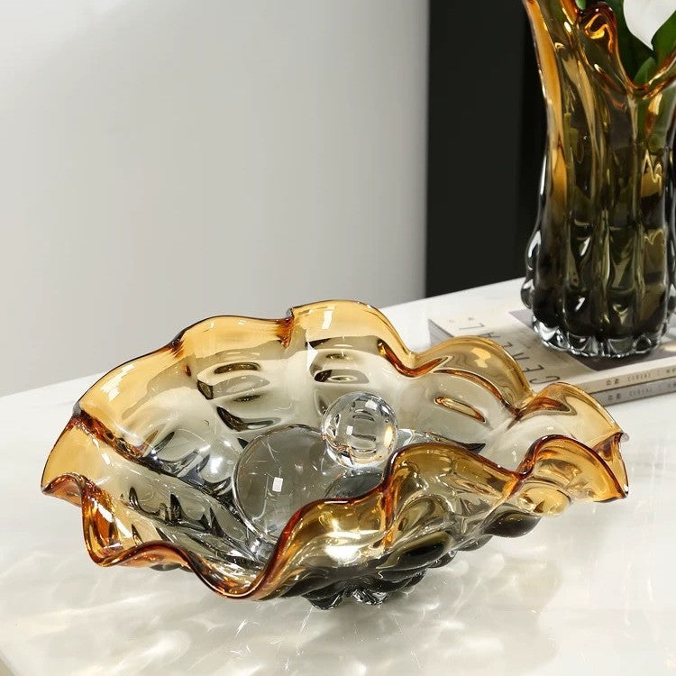 Detail of wavy rim amber and grey glass centerpiece bowl
