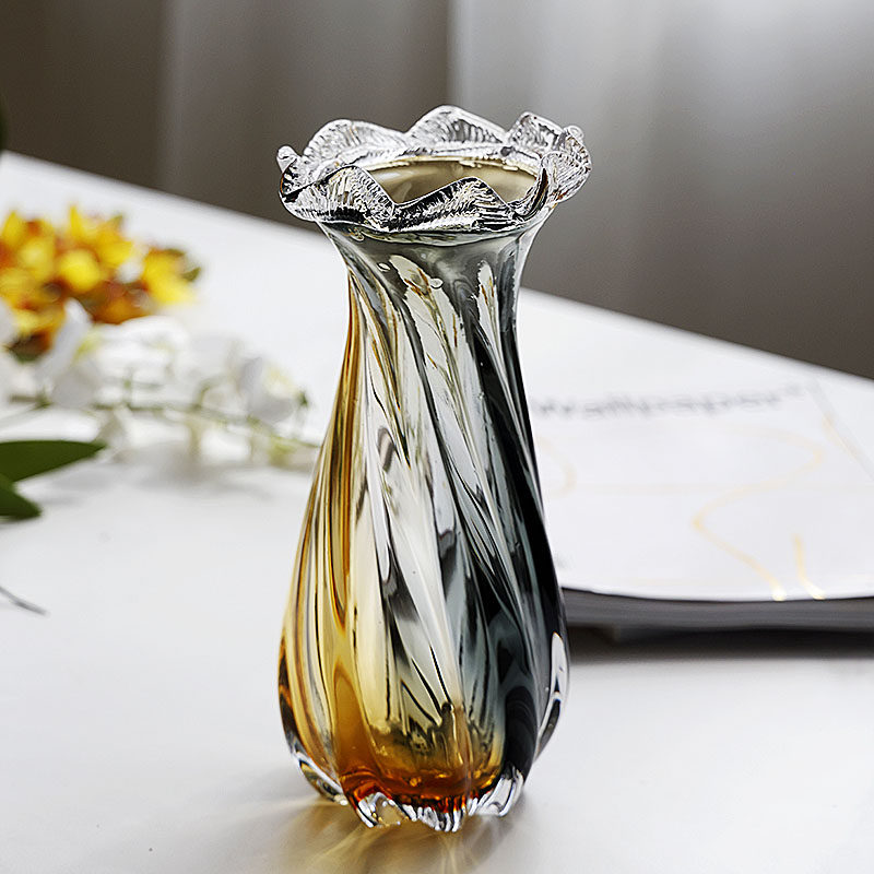 Medium art glass vase with ruffled rim in sunlight