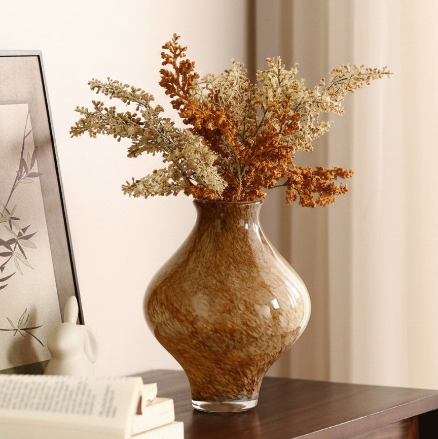 Full view of amber glass vase with mottled pattern