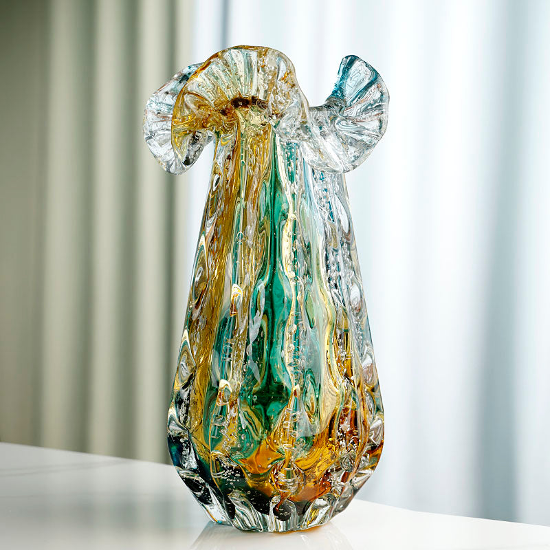 Tall amber and teal art glass vase with ruffled rim