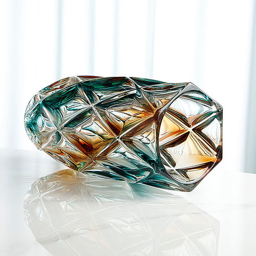 Angled view showing geometric facets and gradient color