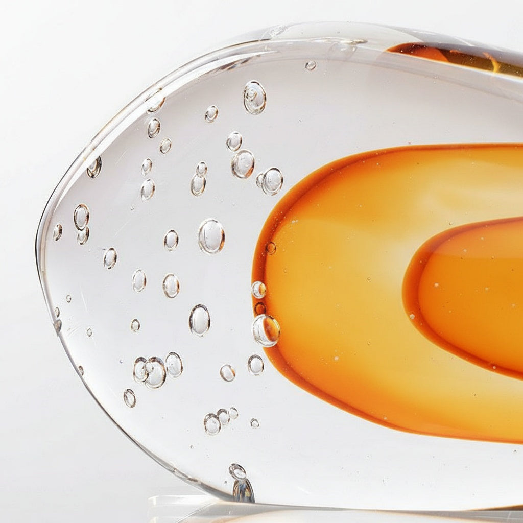 Close up of controlled bubbles within amber glass