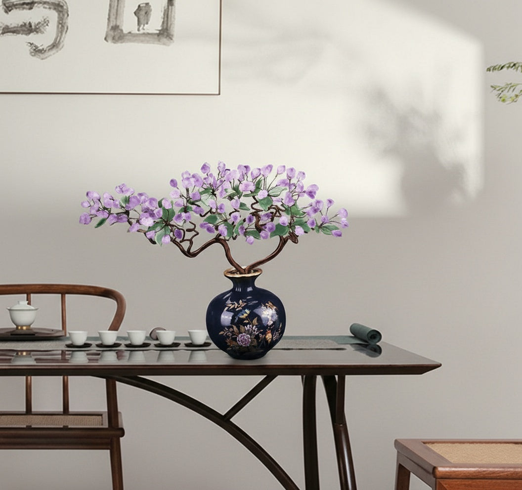 Wide shot of amethyst crystal bonsai tree on table in modern interior