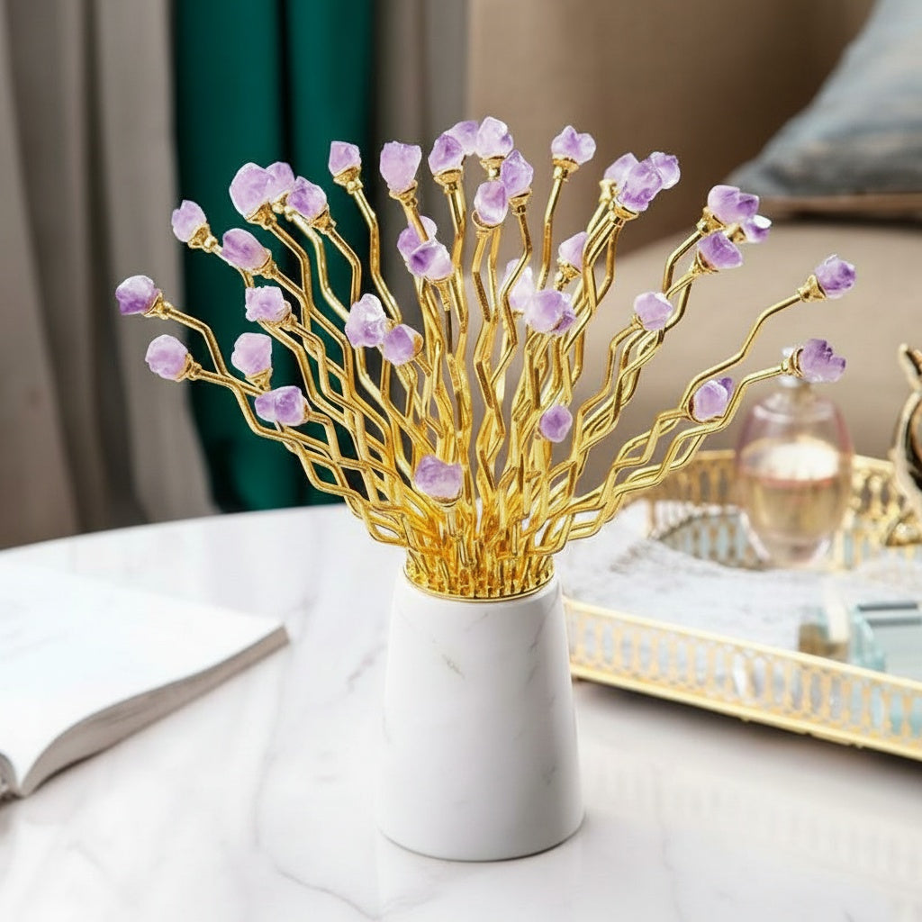 Close view of the purple stones and wavy gold-tone metal branches