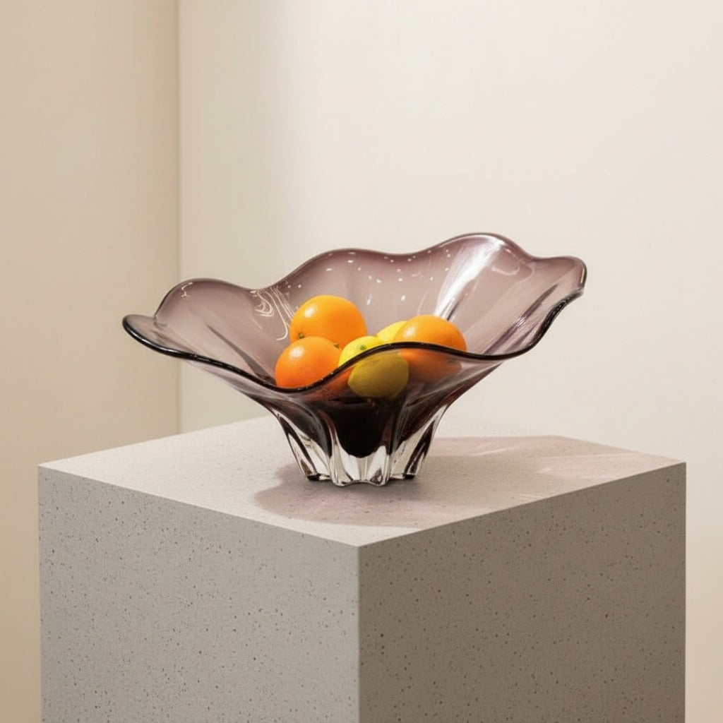 High angle view of amethyst wavy glass bowl with fruit