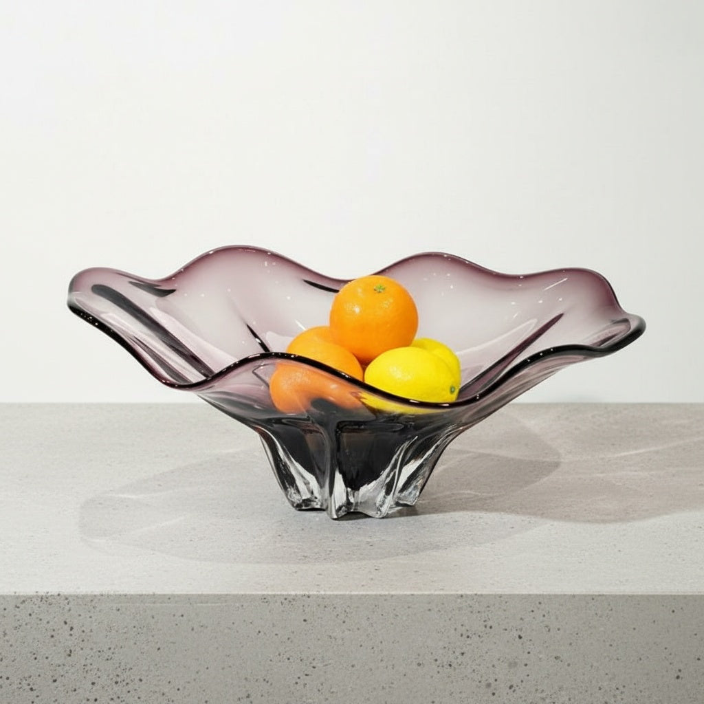 Side profile of purple gradient glass centerpiece bowl on white table
