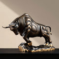 Side profile of antique copper charging bull sculpture on black surface