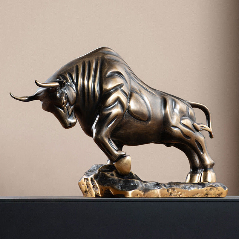 Angled view of muscular copper bull statue with antique finish