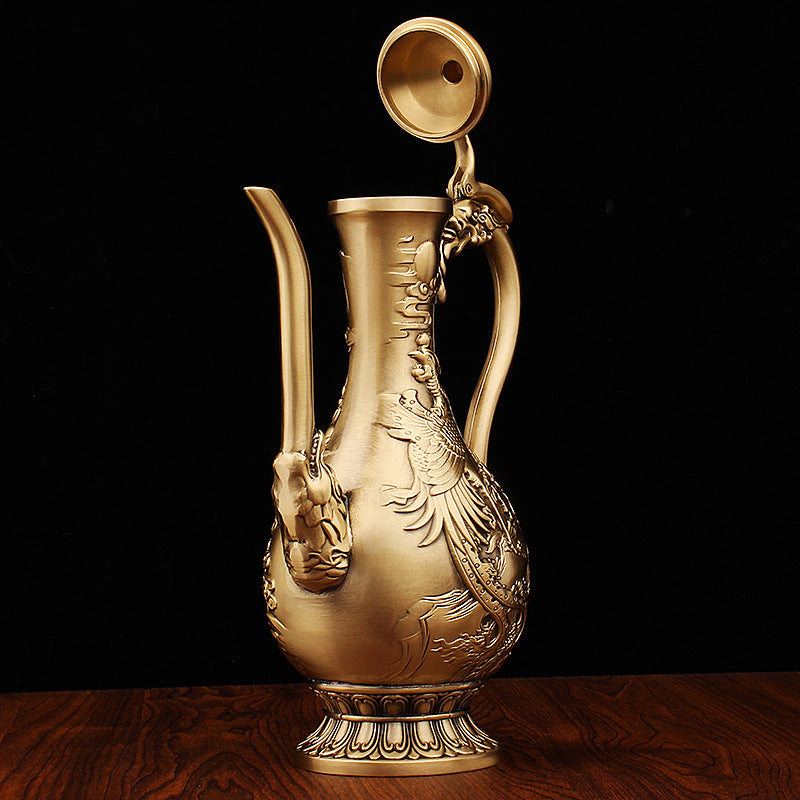 Detail of open lid on antique copper dragon teapot