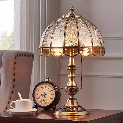 Antique copper table lamp with textured glass dome shade and pull chains