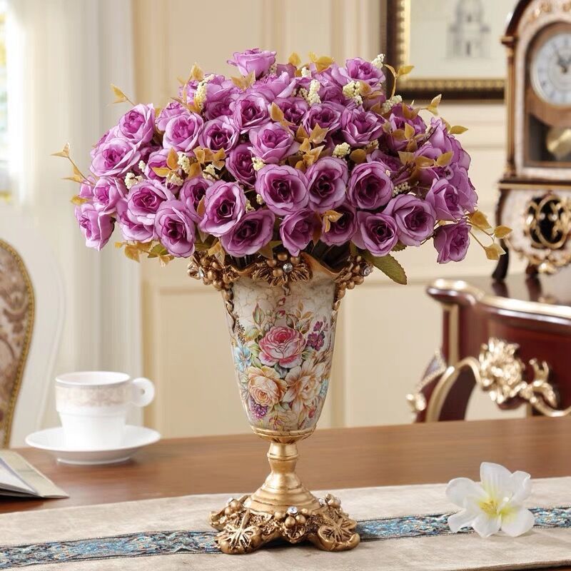 Luxury resin pedestal vase holding purple roses on dining table