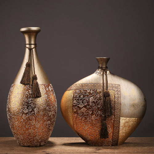 Antique gold resin vases with crackle finish and tassels