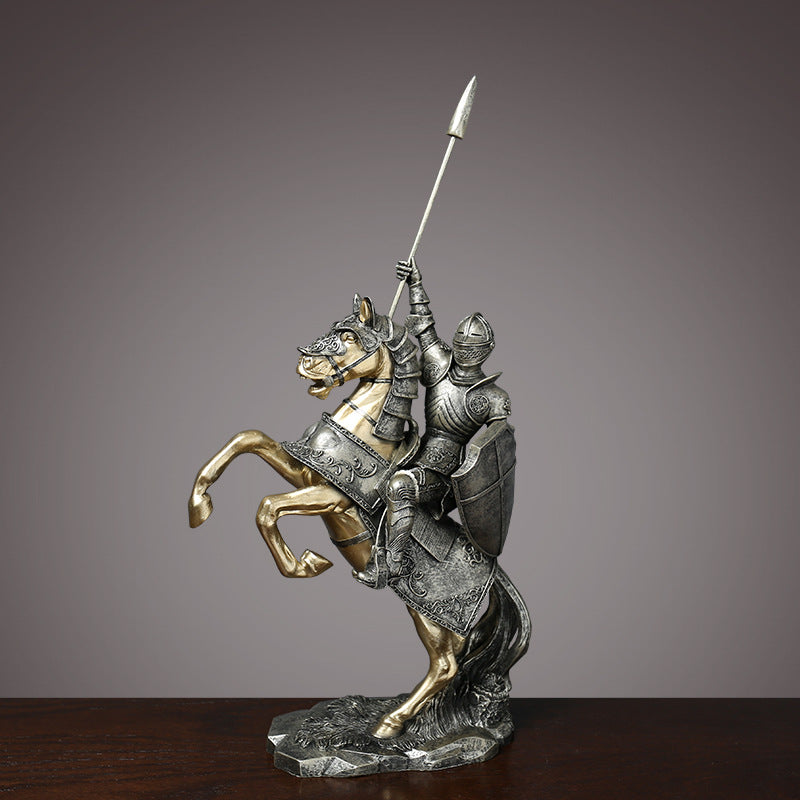 Rearing knight statue in antique silver armor on gold horse