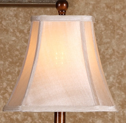 Close up of bell shaped fabric lamp shade