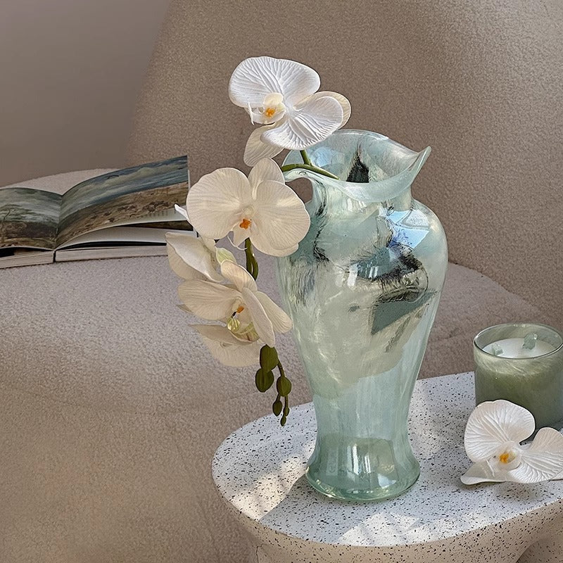 Top down view of ruffled rim glass vase