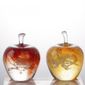 Pair of art glass apple sculptures in red and yellow amber