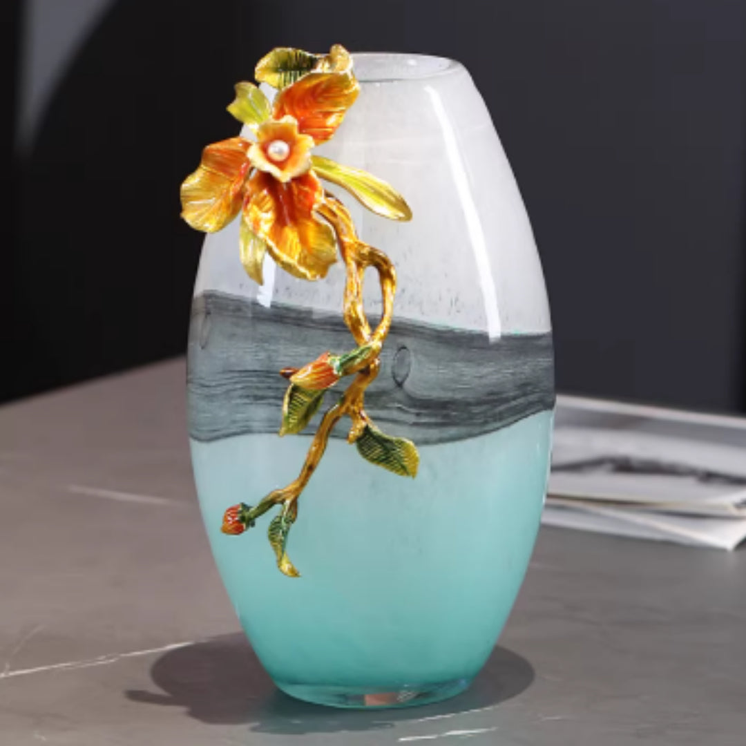 Close up of enamel orchid detail on glass vase