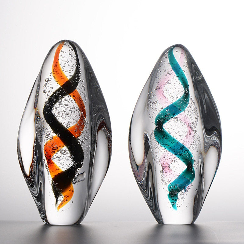 Pair of luxury glass sculptures in warm and cool tones