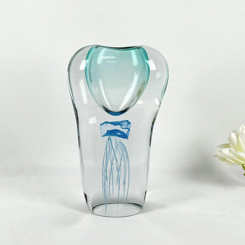 Medium blue art glass vase with internal jellyfish design