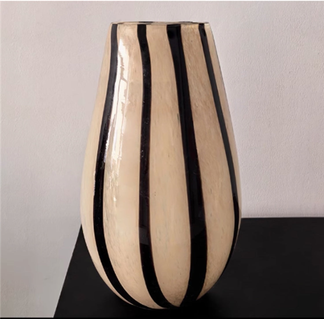 Large teardrop beige and black striped vase detail